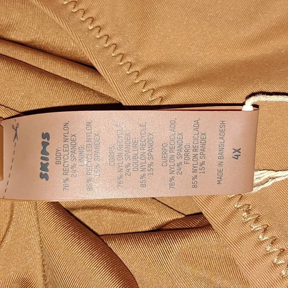SKIMS‎ Swim mock neck cycle suit. NWT
